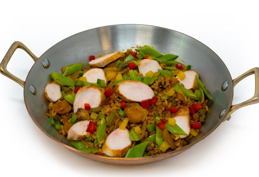 Paella con riso integrale e coniglio