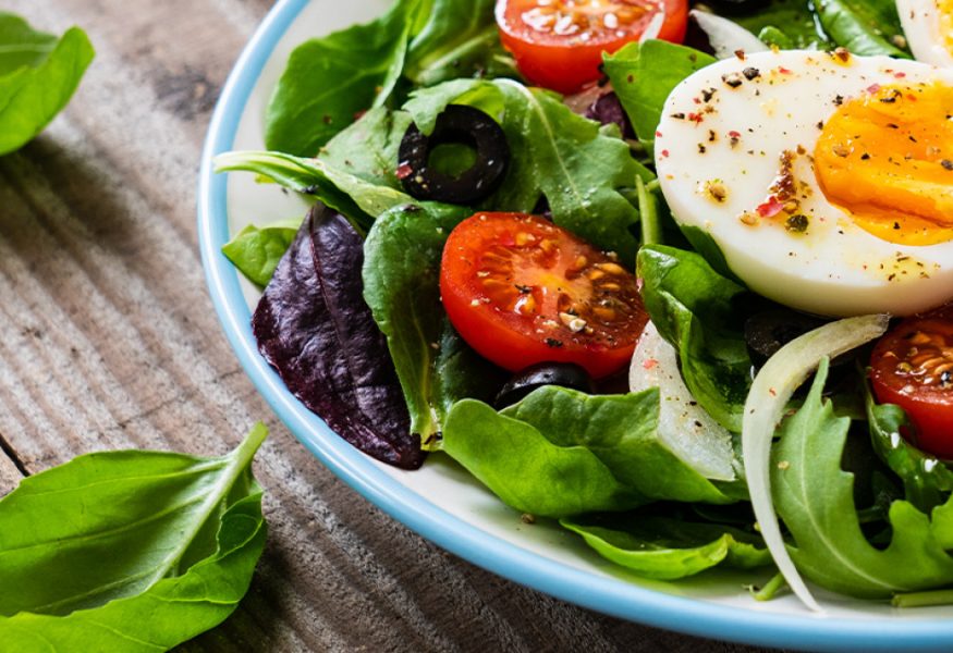 Baby spinach, vegetable, rice, egg, sprout and seed salad